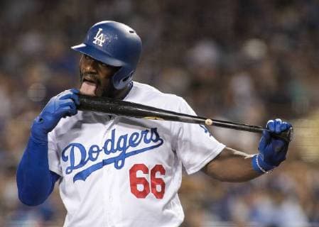 Sport Themen der Woche KW38 Sport Bilder des Tages September 22, 2018 - Los Angeles, California, U.S - Yasiel Puig 66 of the Los Angeles Dodgers licks his bat during their game with the San Diego Padres on Saturday September 22, 2018 at Dodger Stadium in Los Angeles, California. Dodgers defeat Padres, 7-2. Dodgers defeat Padres, 7-2 - ZUMAp124 20180922_zaa_p124_025 Copyright: xJavierxRojasx