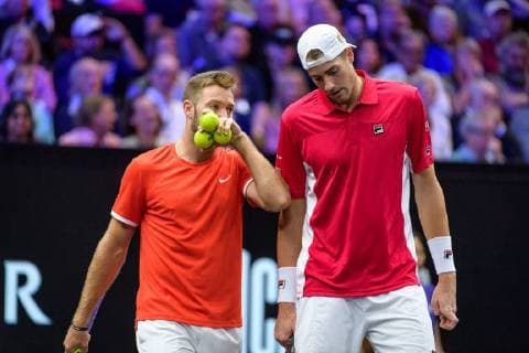 CHICAGO, IL - SEPTEMBER 23: Team World s Jack Sock of the United States of America and Team World s John Isner of the United States of America talk strategy during a doubles match on day three of the 2018 Laver Cup on September 23, 2018, at the United Center in Chicago, Illinois. Sock & Isner beats Federer & Zverev 4-6, 7-6(2), 11-9 . (Photo by Daniel Bartel Icon Sportswire) TENNIS: SEP 23 Laver Cup Icon180923004 EDITORIAL USE ONLY