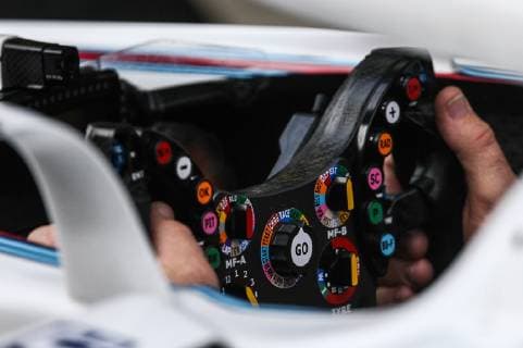 SOCHI, RUSSIA - SEPTEMBER 29, 2018: Williams Martini Racing mechanics prepare for practice sessions in their pit at the 2018 Formula One VTB Russian Grand Prix at the Sochi Autodrom racing circuit. Yegor Aleyev TASS  TS091EDD