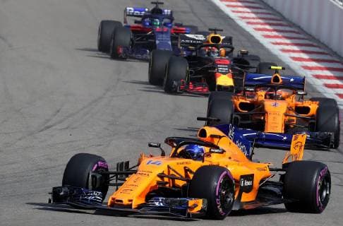 SOCHI, RUSSIA â€“ SEPTEMBER 30, 2018: McLaren F1 Team driver Fernando Alonso (front) of Spain in action during the 2018 Formula One Russian Grand Prix at the Sochi Autodrom racing circuit. Sergei Fadeichev TASS  TS09204D