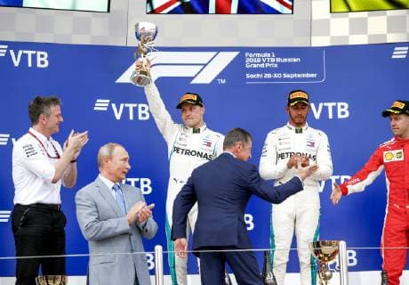 Motorsports: FIA Formula One World Championship WM Weltmeisterschaft 2018, Grand Prix of Russia, , 5 Sebastian Vettel (GER, Scuderia Ferrari) 44 Lewis Hamilton (GBR, Mercedes AMG Petronas F1 Team), 77 Valtteri Bottas (FIN, Mercedes AMG Petronas), Vladimir Putin, President of Russia on the podium Sochi Russia