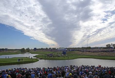 Clouds cover players and fans at the Ryder Cup at Le Golf National in Guyancourt near Paris on September 30, 2018. Team Europe defeated Team USA 17.5 to 10.5 to hand the Americans their sixth straight loss on foreign soil.  PAR20180930084 DAVIDxSILPA