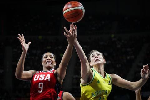 (181001) -- TENERIFE, Oct. 1, 2018 -- A Ja Wilson (L) of the United States and Alex Bunton of Australia compete for the ball during the final match at the 2018 FIBA Women s Basketball World Cup at Santiago Martin in San Cristobal de La Laguna in Tenerife, Spain, Sept. 30, 2018. The United States won 73-56 and claimed the champion. ) ZhengxHuansong 