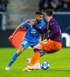 02.10.2018, xfux, Fussball UEFA Champions League, TSG 1899 Hoffenheim - Manchester City FC, emspor, v.l. Kerem Demirbay (TSG 1899 Hoffenheim), Aymeric Laporte (Manchester City FC) Sinsheim