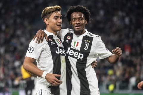 Paulo Dybala and Juan Cuadrado of Juventus celebrates during the UEFA Champions League group stage match between Juventus and Young Boys at the Juventus Stadium, Turin, Italy on 2 October 2018. Copyright: xAlbertoxGandolfox 21310065