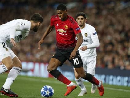 Markus Rashford of Manchester United ManU turns Cristiano Piccini of Valencia during the UEFA Champions League Group H match at Old Trafford Stadium, Manchester. Picture date: 2nd September 2018. Picture credit should read: Andrew Yates Sportimage EDITORIAL USE ONLY. No use with unauthorised audio, video, data, fixture lists, club league logos or live services. Online in-match use limited to 120 images, no video emulation. No use in betting, games or single club league player publications.