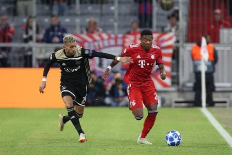 l-r: im Zweikampf, Aktion, mit Hakim Ziyech 22 (Ajax Amsterdam) und David Alaba 27 (FC Bayern Muenchen), FC Bayern Muenchen vs. Ajax Amsterdam, Fussball, Vorrunde, Champions League, 02.10.2018 Muenchen Bayern Deutschland
