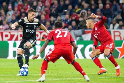 02.10.2018, xkvx, Fussball UEFA Champions League, FC Bayern Muenchen - Ajax Amsterdam emspor, v.l. Dusan Tadic (Ajax Amsterdam), David Alaba (FCB - FC Bayern Muenchen), Thiago (FCB - FC Bayern Muenchen) (DFL DFB REGULATIONS PROHIBIT ANY USE OF PHOTOGRAPHS as IMAGE SEQUENCES and or QUASI-VIDEO) Muenchen