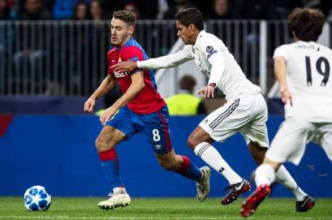 MOSCOW, RUSSIA - OCTOBER 2, 2018: CSKA Moscow s Nikola Vlasic (L) and Real Madrid s Raphael Varane fight for the ball in their 2018 19 UEFA Champions League Group G Round 2 football match at Luzhniki Stadium. Valery Sharifulin TASS  TS0923D7