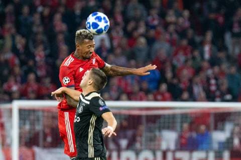 02.10.2018, xkvx, Fussball UEFA Champions League, FC Bayern Muenchen - Ajax Amsterdam emspor, v.l. Jerome Boateng (FCB - FC Bayern Muenchen), Dusan Tadic (Ajax Amsterdam) (DFL DFB REGULATIONS PROHIBIT ANY USE OF PHOTOGRAPHS as IMAGE SEQUENCES and or QUASI-VIDEO) Muenchen