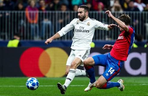 MOSCOW, RUSSIA - OCTOBER 2, 2018: Real Madrid s Dani Carvajal (L) and CSKA Moscow s Kirill Nababkin fight for the ball in their 2018 19 UEFA Champions League Group G Round 2 football match at Luzhniki Stadium. Anton Novoderezhkin TASS  TS0923DD