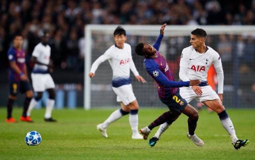 Barcelona s Nelson Semedo is fouled by Tottenham s Erik Lamela during the UEFA Champions League Group B match at Wembley Stadium, London. Picture date: 3rd October 2018. Picture credit should read: David Kein Sportimage EDITORIAL USE ONLY. No use with unauthorised audio, video, data, fixture lists, club league logos or live services. Online in-match use limited to 120 images, no video emulation. No use in betting, games or single club league player publications.