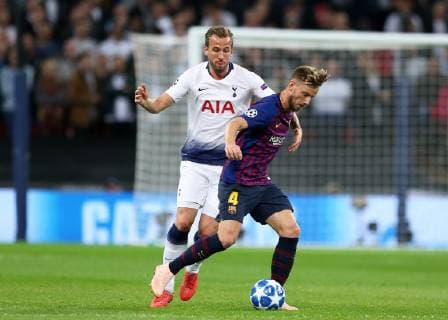 3rd October 2018, Wembley Stadium, London England; UEFA Champions League football, Tottenham Hotspur versus Barcelona; Harry Kane of Tottenham Hotspur challenges Ivan Rakitic of Barcelona  ActionPlus12067645 JohnxPatrickxFletcher