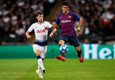 Barcelona s Luis Suarez takes on Tottenham s Ben Davies during the UEFA Champions League Group B match at Wembley Stadium, London. Picture date: 3rd October 2018. Picture credit should read: David Kein Sportimage EDITORIAL USE ONLY. No use with unauthorised audio, video, data, fixture lists, club league logos or live services. Online in-match use limited to 120 images, no video emulation. No use in betting, games or single club league player publications.