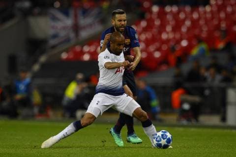 Lucas of Tottenham and Jordi Alba of Barcelona battle for the ball Group B match of the UEFA Champions League between Tottenham Hotspurs and FC Barcelona Barca at Wembley Stadium on October 03, 2018 in London, England.