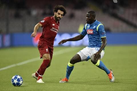 Mohamed Salah of Liverpool is challenged by Kalidou Koulibaly of Napoli during the UEFA Champions League group C match between SSC Napoli and Liverpool FC at Stadio San Paolo, Naples, Italy on 3 October 2018. Copyright: xGiuseppexMaffiax 21350007