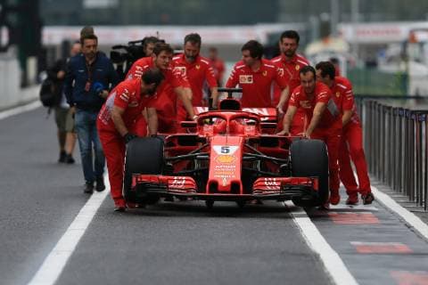 4th October 2018, Suzuka International Racing Course, Suzuka City, Japan; Formula One of Japan, driver arrivals and press conference PK Pressekonferenz Scuderia Ferrari team pushes Sebastian Vettel car back from the FIA garage  ActionPlus12067918 Octane