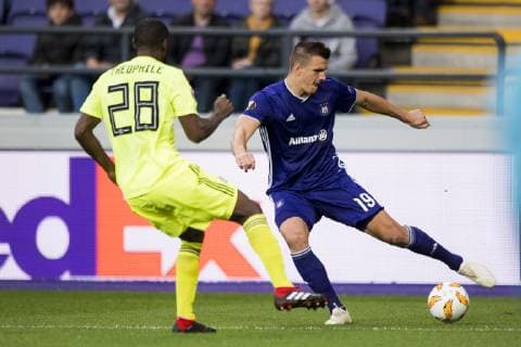Dinamo Zagreb s defender Kevin Theophile-Catherine and Anderlecht s Ivan Santini fight for the ball during a game of Belgian soccer team RSC Anderlecht against Croatian team Dinamo Zagreb in Anderlecht, Thursday 04 October 2018, on day two of the Europa League group stage, in group D. JASPERxJACOBS  x05440542x