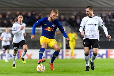 181004 Konrad Laimer of RB Leipzig and Djordje Denic of Rosenborg during the Europa League match between Rosenborg and RB Leipzig on October 4, 2018 in Trondheim. Photo: Jon Olav Nesvold BILDBYRN kod JE 160318 Copyright: JONxOLAVxNESVOLD BB181004JE006