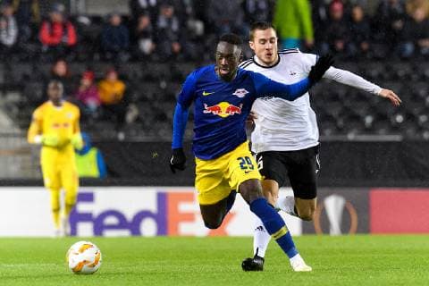 181004 Jean-Kevin Augustin of RB Leipzig and Djordje Denic of Rosenborg during the Europa League match between Rosenborg and RB Leipzig on October 4, 2018 in Trondheim. Photo: Jon Olav Nesvold BILDBYRAN kod JE 160318 Copyright: JONxOLAVxNESVOLD BB181004JE007