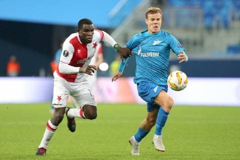 ST PETERSBURG, RUSSIA â€“ OCTOBER 4, 2018: FC Slavia Praha s Michael Ngadeu-Ngadjui (L) and FC Zenit St Petersburg s Alexander Kokorin in action in their 2018 19 UEFA Europa League Group C Round 2 football match at Saint Petersburg Stadium. FC Zenit won the game 1:0. Peter Kovalev TASS  TS09290B