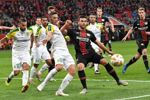 GER, UEFA EL, Bayer 04 Leverkusen (GER) vs. AEK Larnaka (CYP) 04. 10.2018, BayArena, Leverkusen, Europaleque, Vorrunde, GER, UEFA EL, Bayer 04 Leverkusen (GER) vs. AEK Larnaka (CYP), DFL regulations prohibit any use of photographs as image sequences and or quasi-video im Bild picture shows: im Strafraum Kevin Volland (Leverkusen 31), im Zweikampf gegen Apostolos Giannou (AEK Larnaka 99),