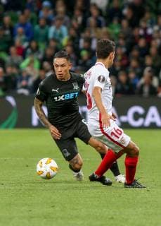 KRASNODAR, RUSSIA â€“ OCTOBER 4, 2018: FC Krasnodar s Cristian Ramirez (L) and Sevilla s Jesus Navas in action in their 2018 19 UEFA Europa League Group J Round 2 football match at Krasnodar Stadium. Vitaly Timkiv TASS  TS092954