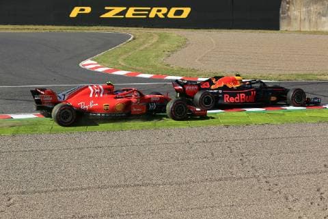 7th October 2018, Suzuka International Racing Course, Suzuka City, Japan; Formula One Grand Prix of Japan, race day; Scuderia Ferrari, Kimi Raikkonen pushed wide by Aston Martin Red Bull Racing TAG Heuer, Max Verstappen  ActionPlus12069101 Octane