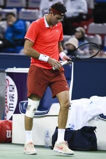 Juan Martin Del Potro of Argentina reacts as he competes against Borna Coric of Croatia in their third round match of the men s singles during the Rolex Shanghai Masters 2018 tennis tournament in Shanghai, China, 11 October 2018. Juan Martin del Potro hobbled out of the Shanghai Masters last 16 on Thursday after hurting his right knee in an awkward fall. The Argentine world number four, who had already been suffering with a virus, lost his footing at 5-5 in the first set against Croatia s Borna Coric. The 30-year-old Del Potro had lengthy treatment and strapping put on his knee, but conceded the match afterlosing the first set 7-5. It caps a miserable few days for the third seed, who lost Sunday s China Open final to unseeded Nikoloz Basilashvili and revealed that he had been under the weather during the upset. Juan Martin del Potro quits Shanghai injured after heavy fall  pbu882957_11