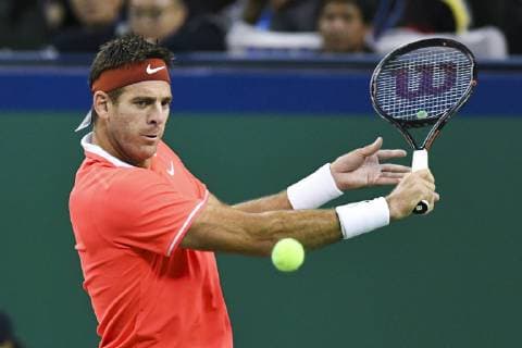 Juan Martin Del Potro of Argentina returns a shot to Borna Coric of Croatia in their third round match of the men s singles during the Rolex Shanghai Masters 2018 tennis tournament in Shanghai, China, 11 October 2018. Juan Martin del Potro hobbled out of the Shanghai Masters last 16 on Thursday after hurting his right knee in an awkward fall. The Argentine world number four, who had already been suffering with a virus, lost his footing at 5-5 in the first set against Croatia s Borna Coric. The 30-year-old Del Potro had lengthy treatment and strapping put on his knee, but conceded the match afterlosing the first set 7-5. It caps a miserable few days for the third seed, who lost Sunday s China Open final to unseeded Nikoloz Basilashvili and revealed that he had been under the weather during the upset. Juan Martin del Potro quits Shanghai injured after heavy fall 