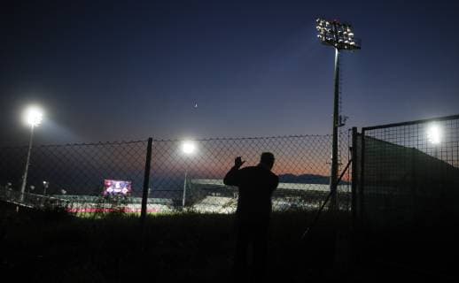 Sport Bilder des Tages A lone fan waits to watch the match from a hill overlooking the stadium before the Uefa Nations League, Group A4 match at Stadion HNK Rijeka, Rijeka. Picture date: 12th October 2018. Picture credit should read: David Klein Sportimage EDITORIAL USE ONLY. No use with unauthorised audio, video, data, fixture lists, club league logos or live services. Online in-match use limited to 120 images, no video emulation. No use in betting, games or single club league player publications.