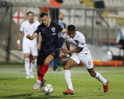 Ivan Perisic of Croatia clouts Marcus Rashford of England in the ear during the Uefa Nations League, Group A4 match at Stadion HNK Rijeka, Rijeka. Picture date: 12th October 2018. Picture credit should read: David Klein Sportimage EDITORIAL USE ONLY. No use with unauthorised audio, video, data, fixture lists, club league logos or live services. Online in-match use limited to 120 images, no video emulation. No use in betting, games or single club league player publications.