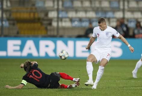 Luka Modric of Croatia tackles Ross Barkley of England during the Uefa Nations League, Group A4 match at Stadion HNK Rijeka, Rijeka. Picture date: 12th October 2018. Picture credit should read: David Klein Sportimage EDITORIAL USE ONLY. No use with unauthorised audio, video, data, fixture lists, club league logos or live services. Online in-match use limited to 120 images, no video emulation. No use in betting, games or single club league player publications.