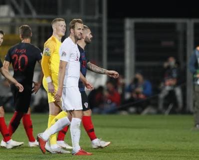 Jordan Pickford and Harry Kane of England look up towards the handful of fans during the Uefa Nations League, Group A4 match at Stadion HNK Rijeka, Rijeka. Picture date: 12th October 2018. Picture credit should read: David Klein Sportimage EDITORIAL USE ONLY. No use with unauthorised audio, video, data, fixture lists, club league logos or live services. Online in-match use limited to 120 images, no video emulation. No use in betting, games or single club league player publications.