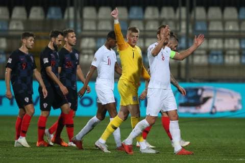 Croatia v England UEFA Nations League Harry Kane of England and Jordan Pickford of England acknowledge the small band of England fans that had watched the match from on top of a hill overlooking the ground at the end of the UEFA Nations League match at Stadion HNK Rijeka, Rijeka Content Not Available For UK Newspapers Copyright: xPaulxChestertonx FIL-12397-0105