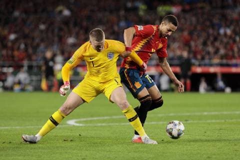 Spain s Rodrigo Moreno and England s Jordan Pickford during UEFA Nations League 2019 match between Spain and England at Benito Villamarin stadium in Sevilla, Spain. October 15, 2018.  (20181015100200123)