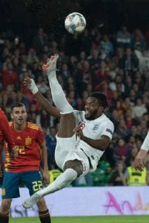 Spain: UEFA Nations League between Spain and Engla Nathaniel Chalobah, England, clear the ball during the match between Spain and England in Benito Villamarin Stadium in Seville. Sevilla Spain  JavierxMontanox xPacificxPress