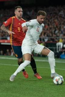 Spain: UEFA Nations League between Spain and Engla Paco Alcácer of Spain and Kyle Walrker of England, fight for the ball during the match between Spain and England in Benito Villamarin Stadium in Seville. Sevilla Spain  JavierxMontanox xPacificxPress