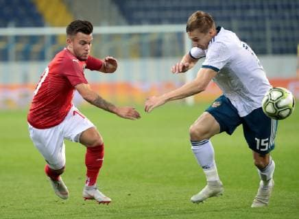 Sport Bilder des Tages SOCCER - Under-21 EURO 2019, AUT VS RUS SANKT POELTEN,AUSTRIA,16.OCT.18 - SOCCER - OEFB international match Länderspiel Under-21 European Championship EM Europameisterschaft 2019, qualification, Austria vs Russia. Image shows Sascha Horvath (AUT) and Mikhail Lysov (RUS). GEPAxpictures xWalterxLuger