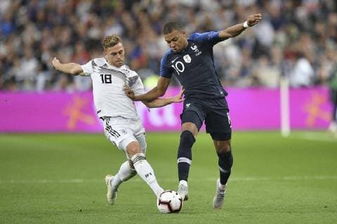 (181017) -- SAINT-DENIS, Oct. 17, 2018 -- Kylian Mbappe (R) of France vies with Joshua Kimmich of Germany during the UEFA Nations League soccer match League A Group 1 at the Stade de France in Saint-Denis, France, on Oct. 16, 2018. France won 2-1. ) (SP)FRANCE-SAINT-DENIS-SOCCER-UEFA-NATIONS LEAGUE-FRANCE VS GERMANY JackxChan 