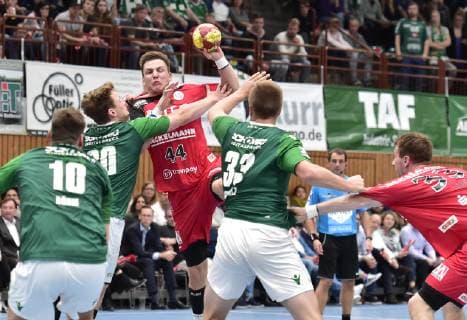 17.10.2018 - Handball - DHB-Pokal - Achtelfinale - Saison 2018 2019 - DJK Rimpar Wölfe - HC Erlangen HCE - OGo - Lukas Böhm (10, DJK Rimpar Wölfe ) Lukas Siegler (20, DJK Rimpar Wölfe ) Christoph Steinert (44, HC Erlangen ) Michael Schulz (33, DJK Rimpar Wölfe ) Nikolai Link (33, HC Erlangen HCE )