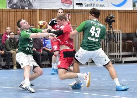 17.10.2018 - Handball - DHB-Pokal - Achtelfinale - Saison 2018 2019 - DJK Rimpar Wölfe - HC Erlangen HCE - OGo - Fin Backs (41, DJK Rimpar Wölfe ) Jan Schäffer (25, HC Erlangen HCE ) Benedikt Brielmeier (43, DJK Rimpar Wölfe )