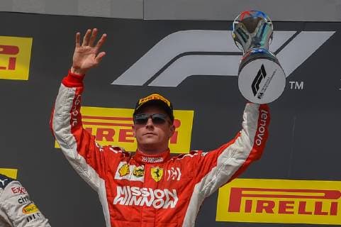 AUSTIN, TX - OCTOBER 21: Ferrari driver Kimi Raikkonen (7) of Finland hoists the trophy high over his head after winning the F1 United States Grand Prix on October 21, 2018, at Circuit of the Americas in Austin, TX. (Photo by Ken Murray Icon Sportswire) AUTO: OCT 21 F1 - United States Grand Prix Icon1810204721 EDITORIAL USE ONLY