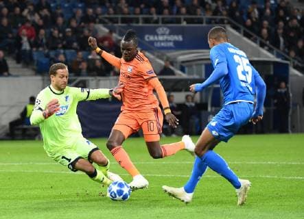 23.10.2018, xmeix, Fussball UEFA Champions League, TSG 1899 Hoffenheim - Olympique Lyon, emspor, v.l. Olympique Lyons Bertrand Traore erzielt das 0:1 für Lyon gegen Oliver Baumann (TSG 1899 Hoffenheim) und Kevin Akpoguma (TSG 1899 Hoffenheim) DFL DFB REGULATIONS PROHIBIT ANY USE OF PHOTOGRAPHS as IMAGE SEQUENCES and or QUASI-VIDEO Sinsheim