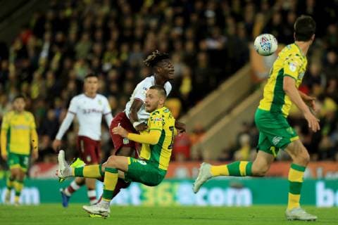 23rd October 2018, Carrow Road, Norwich, England; EFL Championship football, Norwich City versus Aston Villa; Tammy Abraham of Aston Villa runs into Tom Trybull of Norwich City  ActionPlus12072587 ShaunxBrooks