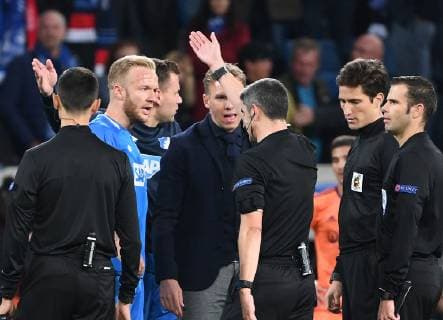 23.10.2018, xmeix, Fussball UEFA Champions League, TSG 1899 Hoffenheim - Olympique Lyon, emspor, v.l. Hoffenheims Trainer Julian Nagelsmann (TSG 1899 Hoffenheim), Kevin Vogt (TSG 1899 Hoffenheim) mit Schiedsrichter Alberto Undiano Mallenco (ESP) DFL DFB REGULATIONS PROHIBIT ANY USE OF PHOTOGRAPHS as IMAGE SEQUENCES and or QUASI-VIDEO Sinsheim