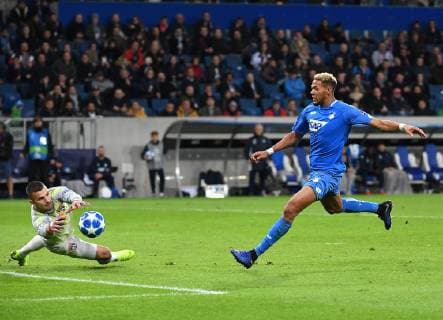 23.10.2018, xmeix, Fussball UEFA Champions League, TSG 1899 Hoffenheim - Olympique Lyon, emspor, v.l. Olympique Lyons Anthony Lopes, Joelinton (TSG 1899 Hoffenheim) DFL DFB REGULATIONS PROHIBIT ANY USE OF PHOTOGRAPHS as IMAGE SEQUENCES and or QUASI-VIDEO Sinsheim