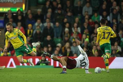 Norwich City v Aston Villa Sky Bet Championship Jack Grealish of Aston Villa is fouled by Tom Trybull of Norwich during the Sky Bet Championship match at Carrow Road, Norwich Content Not Available For UK Newspapers Copyright: xPaulxChestertonx FIL-12446-0135