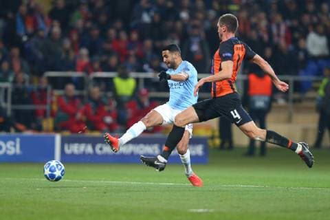 KHARKOV, UKRAINE - OCTOBER 23: Riyad Mahrez of Manchester City shoots under pressure from Serhiy Kryvtsov of Shakhtar Donetsk during the Group F match of the UEFA Champions League between FC Shakhtar Donetsk and Manchester City at Metalist Stadium on October 23, 2018 in Kharkov, Ukraine.  Copyright: xOleksandrxOsipovx
