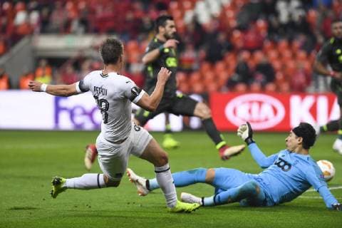 Krasnodar s Sergey Petrov and Standard s goalkeeper Guillermo Ochoa fight for the ball during the match between Belgian soccer team Standard de Liege and Russian team Krasnodar in Liege, Thursday 25 October 2018, on the third day of the UEFA Europa League group stage, in group J. LAURIExDIEFFEMBACQ  x05455343x